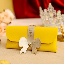 Charger l'image dans la galerie, Pochette avec noeud - La Rayonnantes
